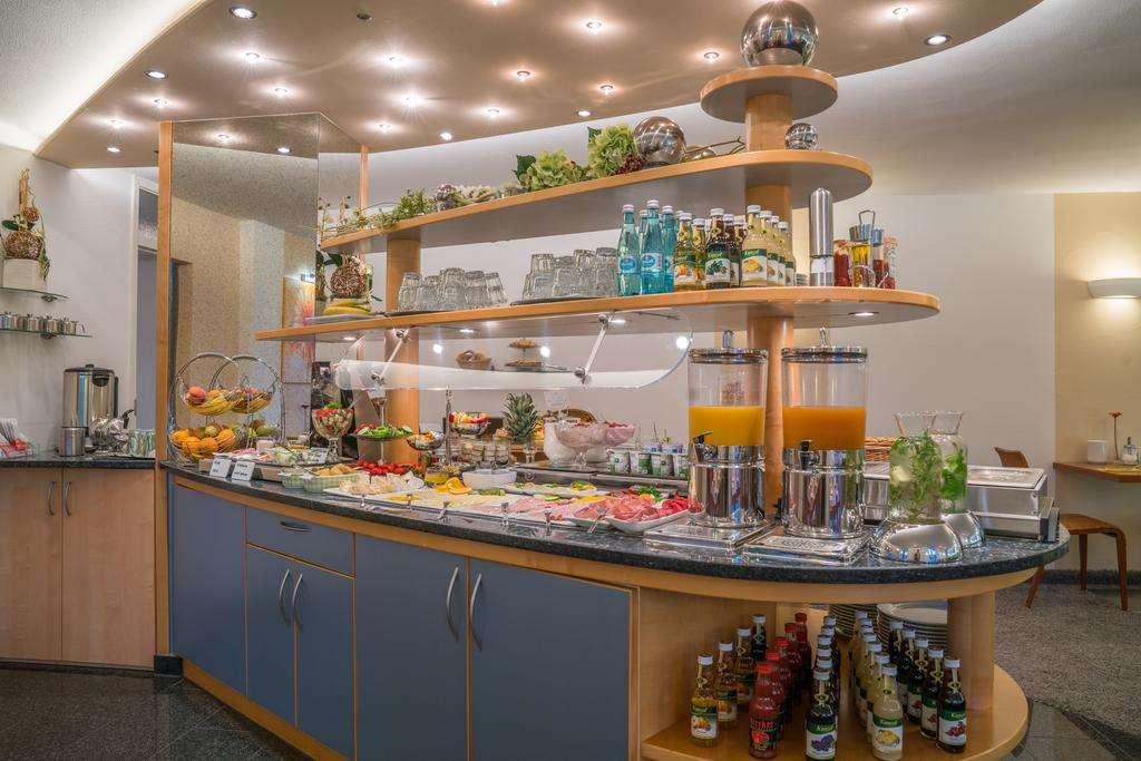 Airporthotel Residenz Штайненброн Ресторан фото